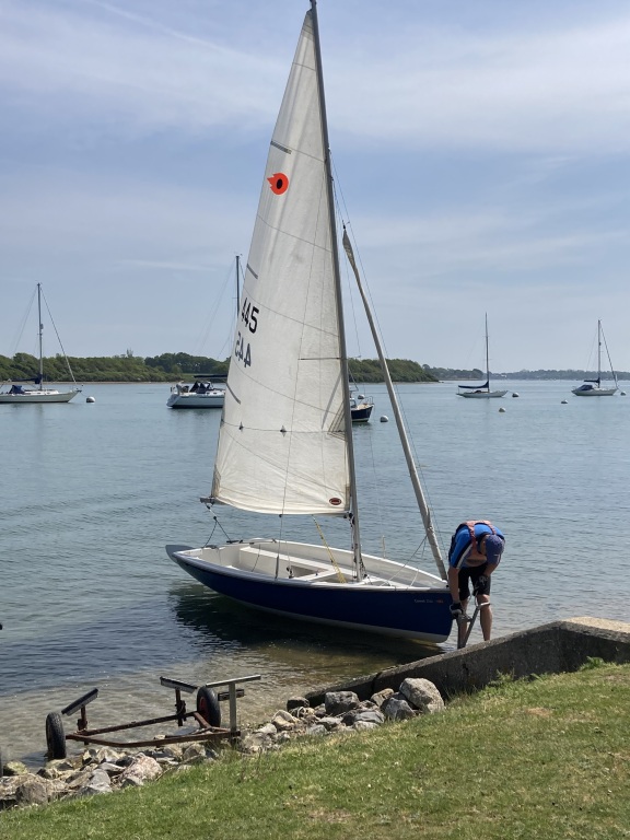 Sailing dinghy being launched